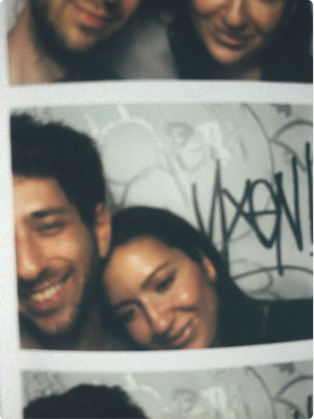 Simone and Andrew in a photobooth